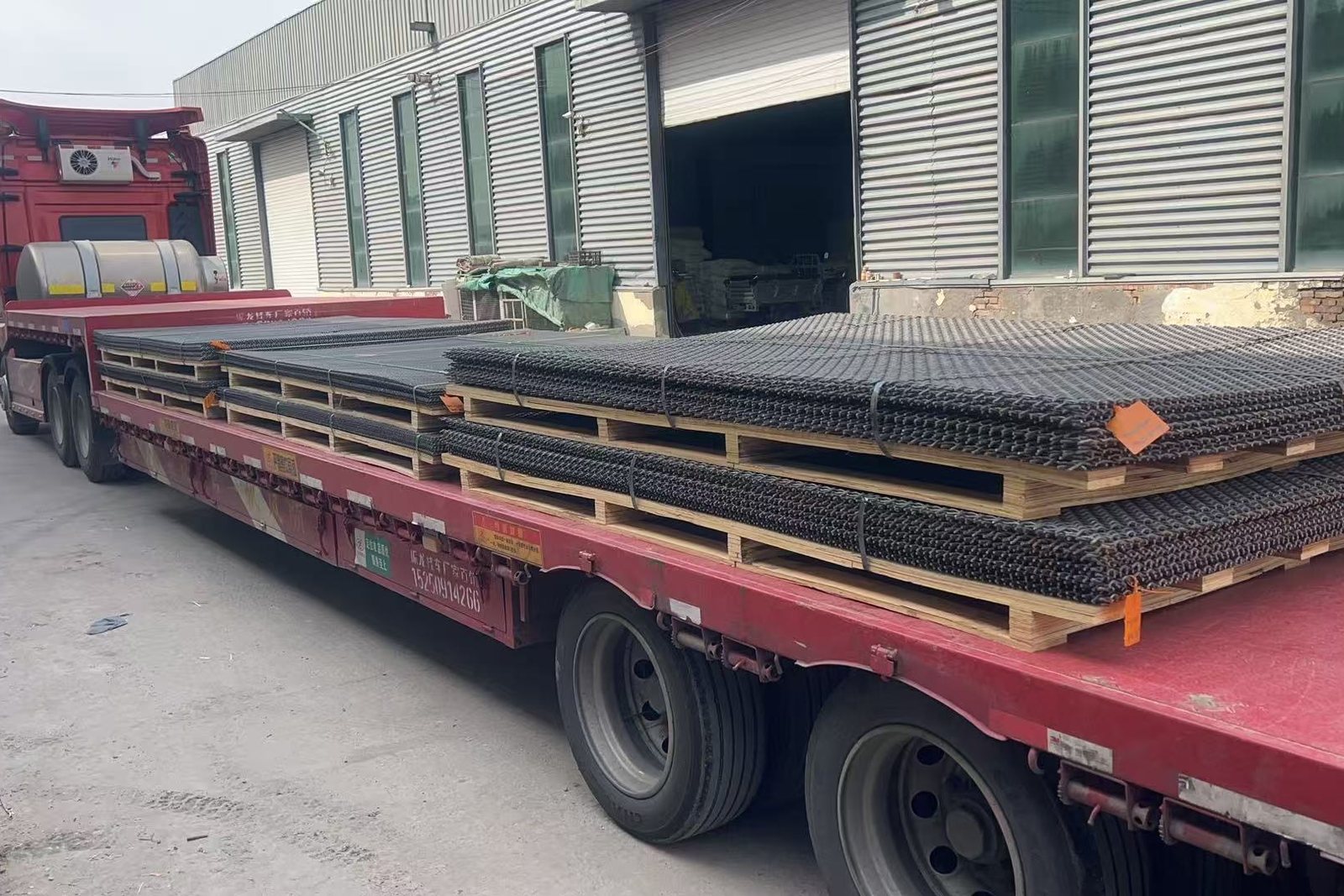 Woven screen panels loaded for transport